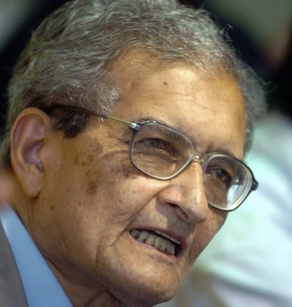 Indian economist Amartya Sen listens to